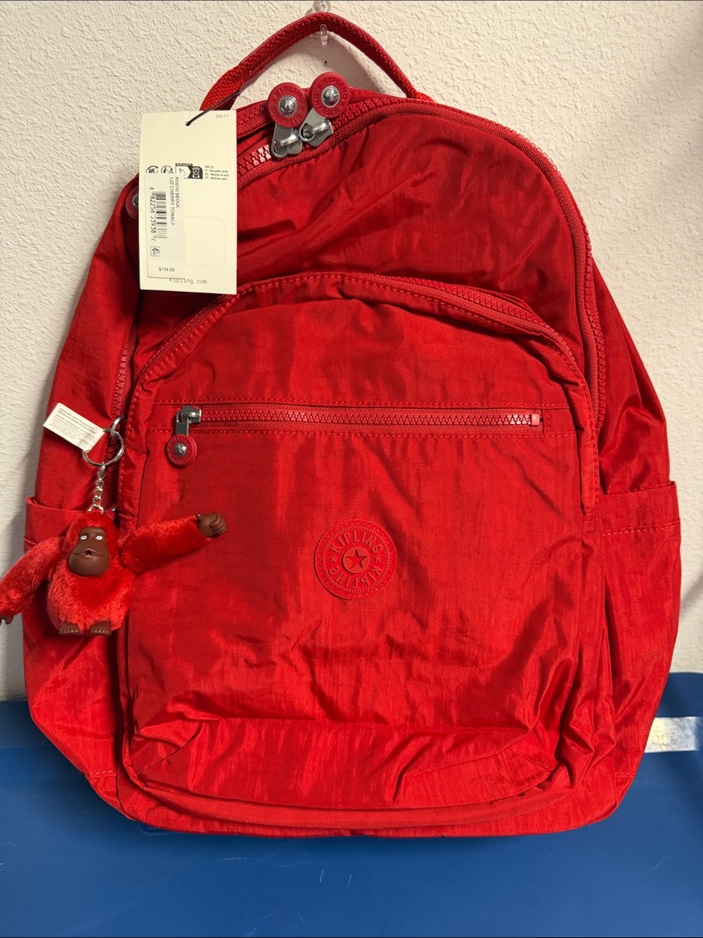 Kipling Bright Red Nylon Backpack with Monkey Charm